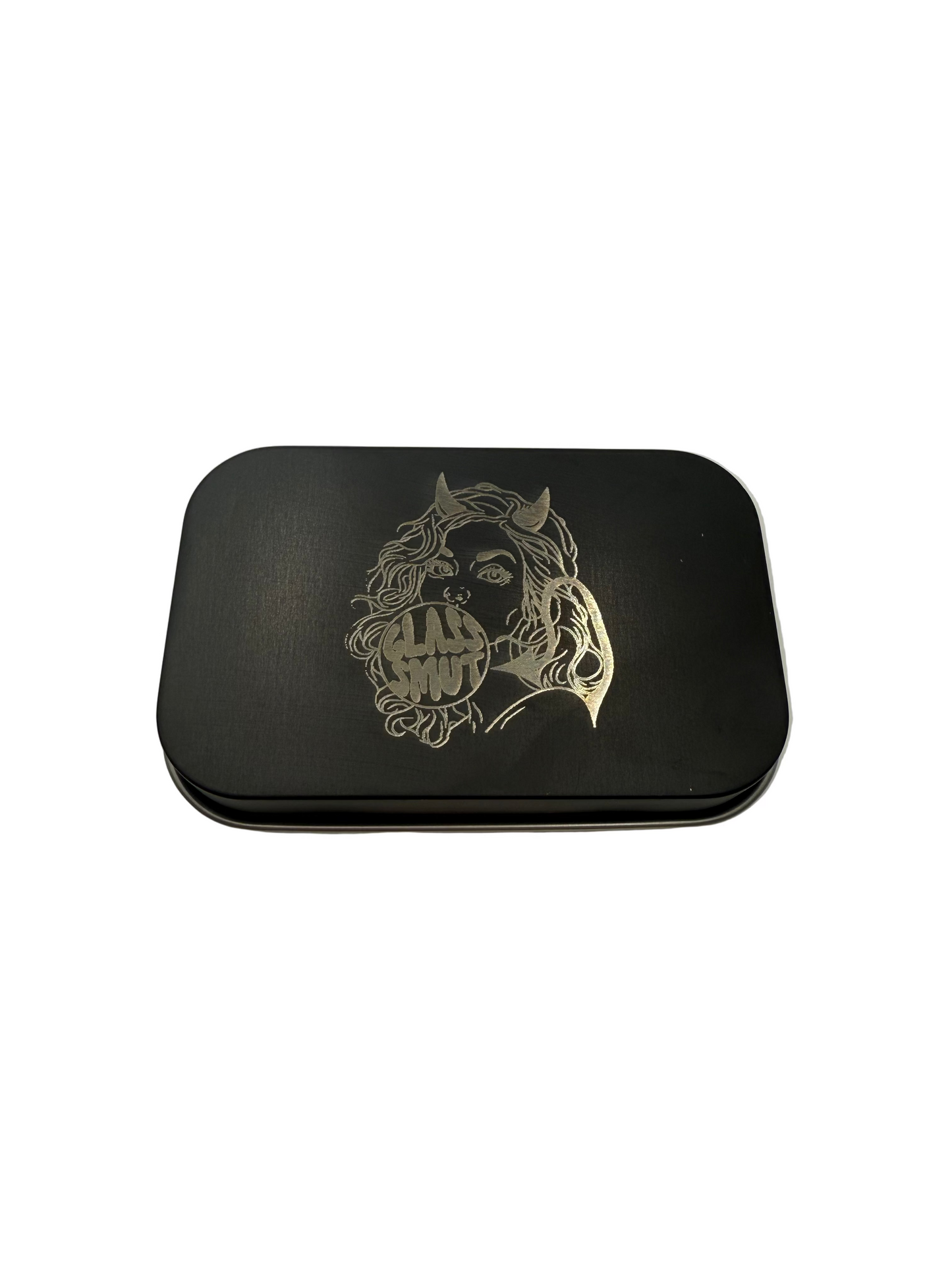 The bottom of a black matte aluminum tin with the Signature GlassSmut Bubble Demon Logo Laser Engraved