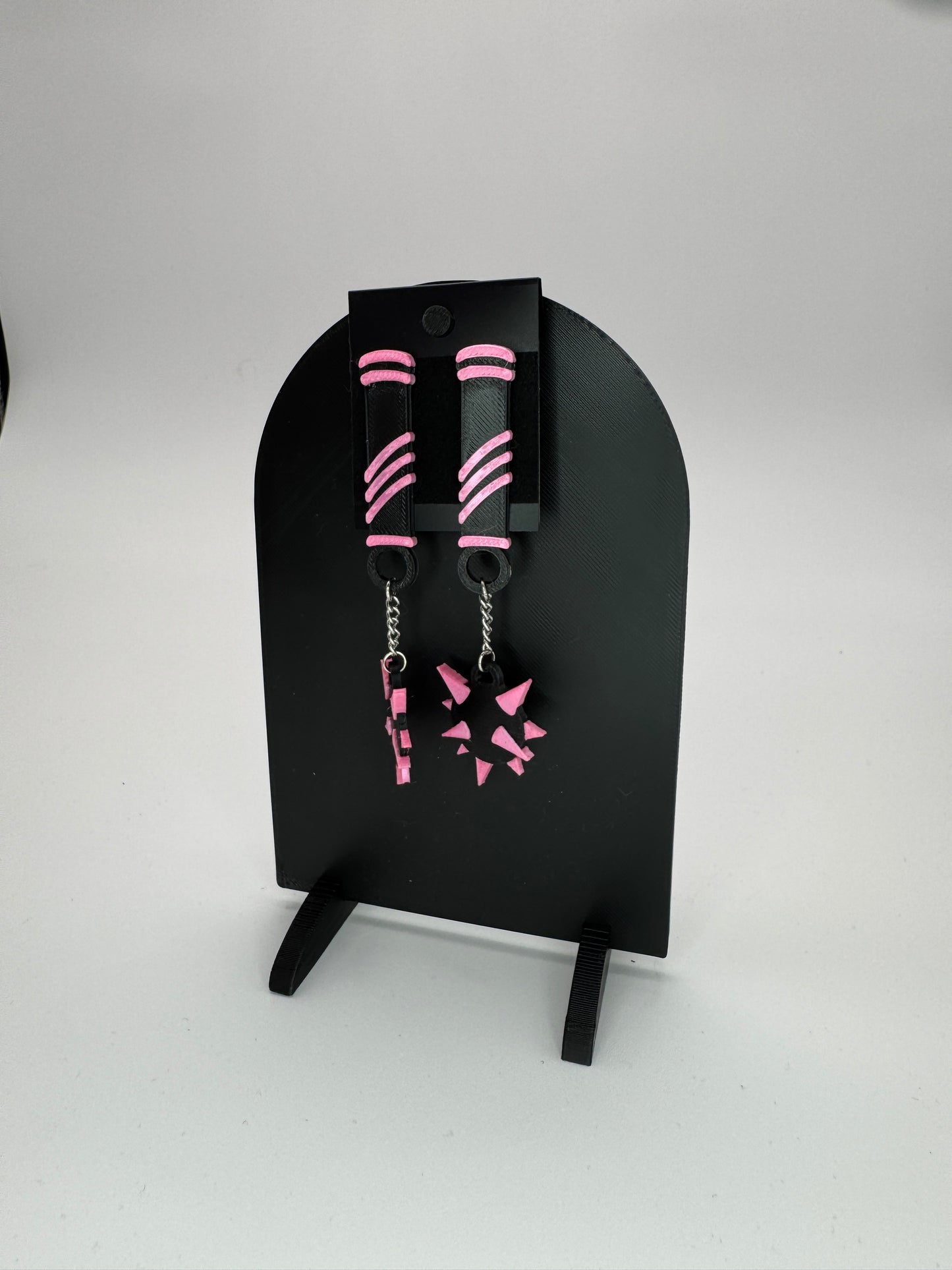 Flail to the Face earrings