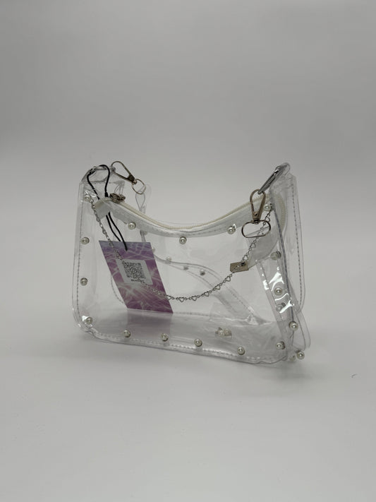 Clear jelly handbag with pearl studs on the front and across shoulder strap, and steel heart accent chain