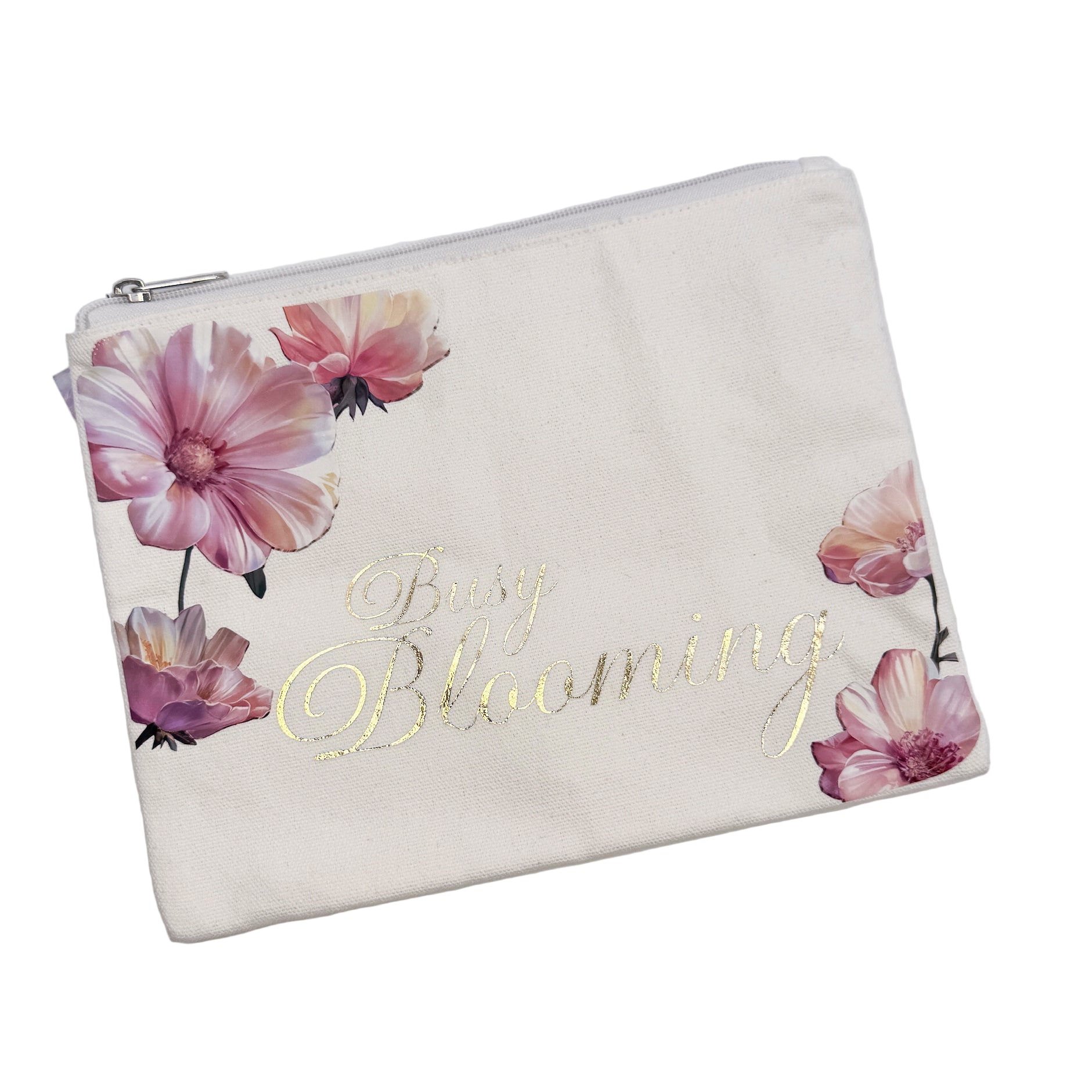 A large pouch with a floral pattern and the text 'Busy Blooming' printed on it.