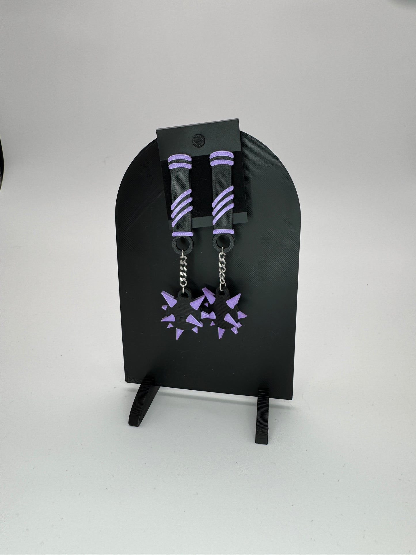 Flail to the Face earrings