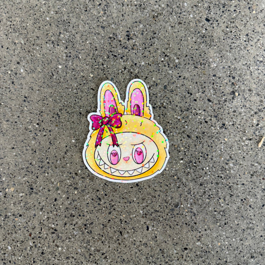 Inspired by Labubu Monster with a bow attached to the ear