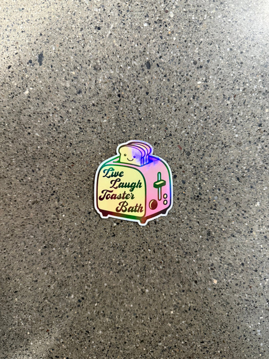 sticker with the image of a toaster that reads "live, laugh, toaster bath" 